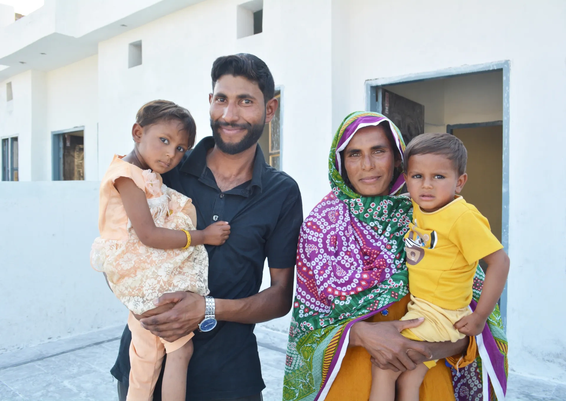 A Pakistan Christian family in their new home
