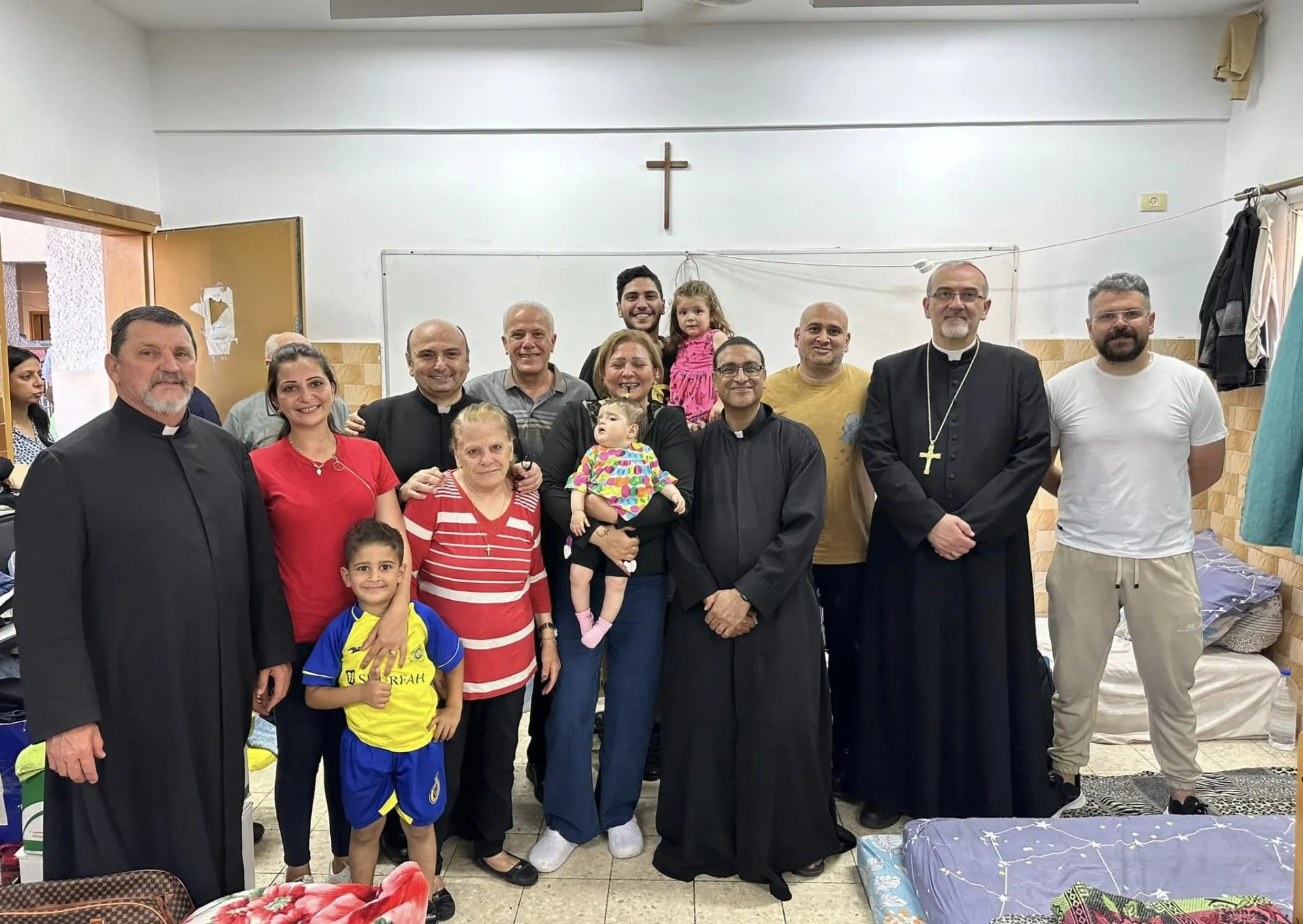 Priests and families from the Holy Land