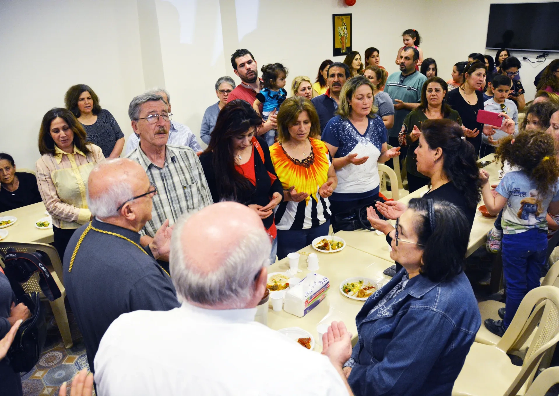 Grace being given ahead of meal