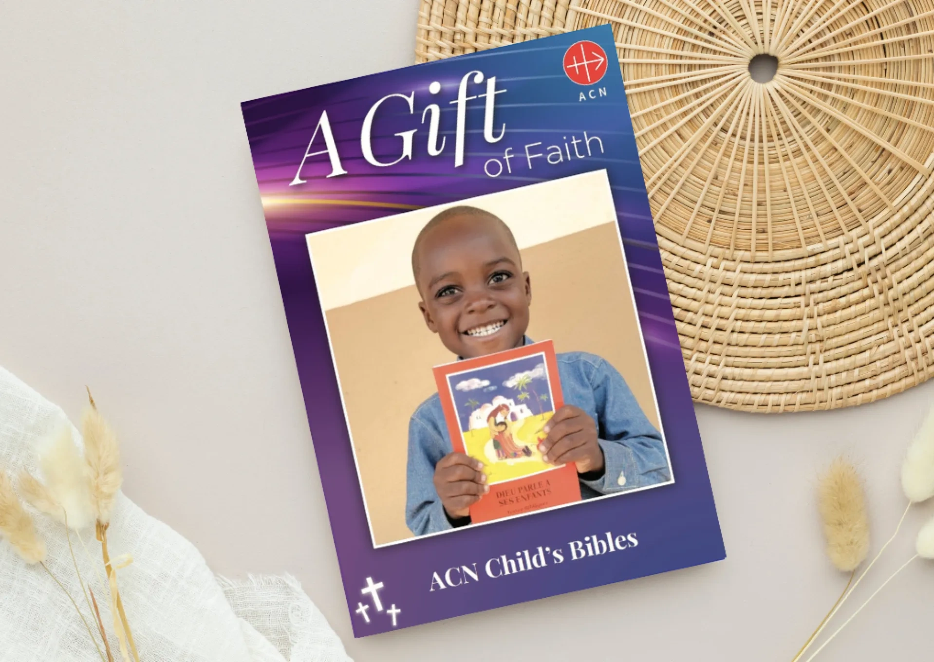 ACN Gift of Faith card on a desk