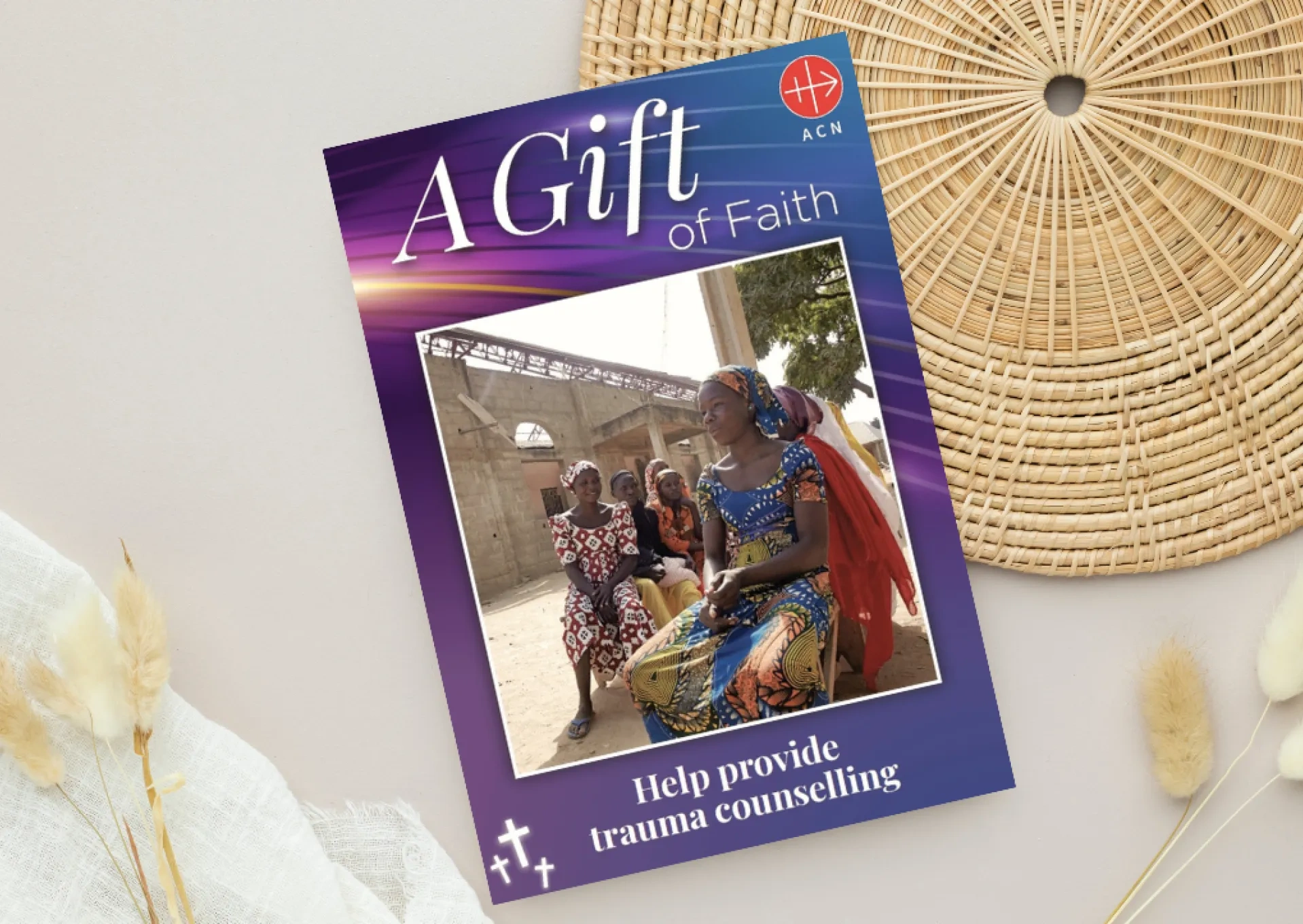 ACN Gift of Faith card on a desk
