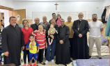 Priests and families from the Holy Land