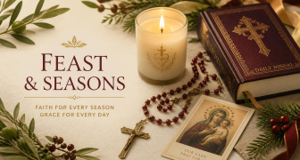 a selection of candles, books, prayer cards and rosaries on a table with plants.