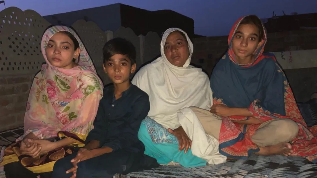 Middle-eastern family sitting together