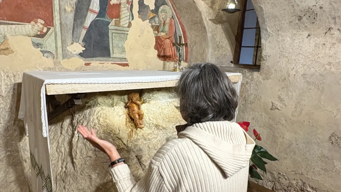 Praying at the alter of St Francis