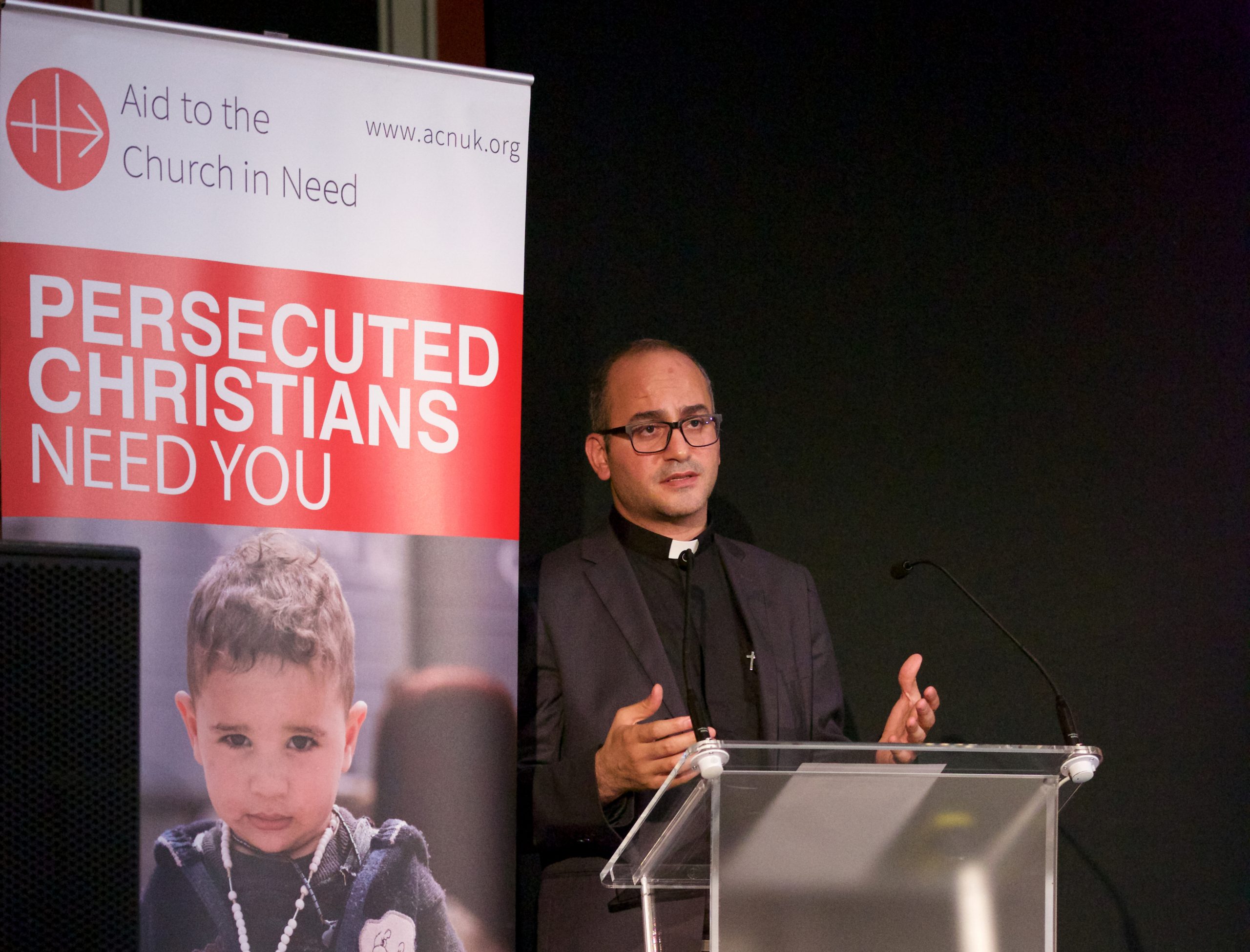 Father Salar Kajo, pictured speaking at ACN's Annual Event on the 14th October 2017 (© Weenson Oo/picture-u.net)