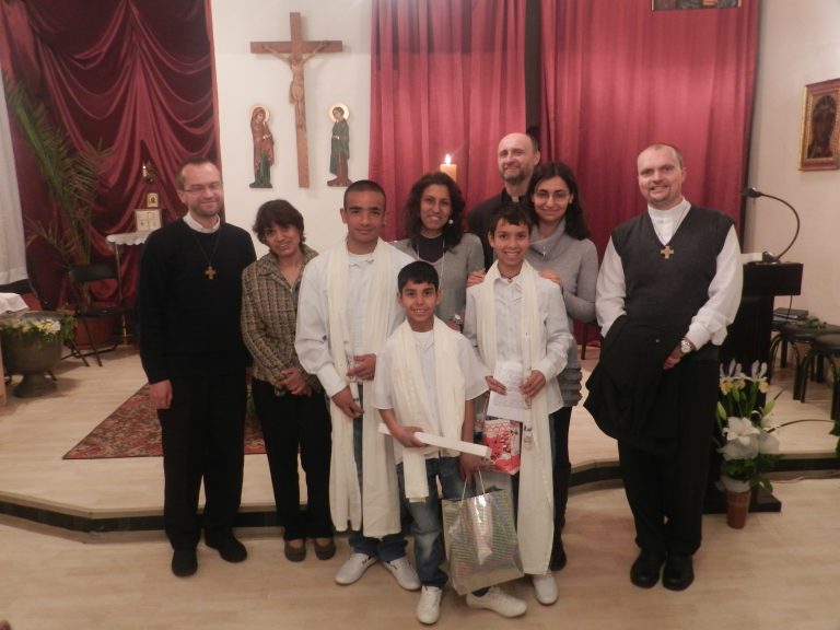 Young candidates for baptism from the Roma community in Stara Zagora, Bulgaria with Father Martin Jilek (right).
