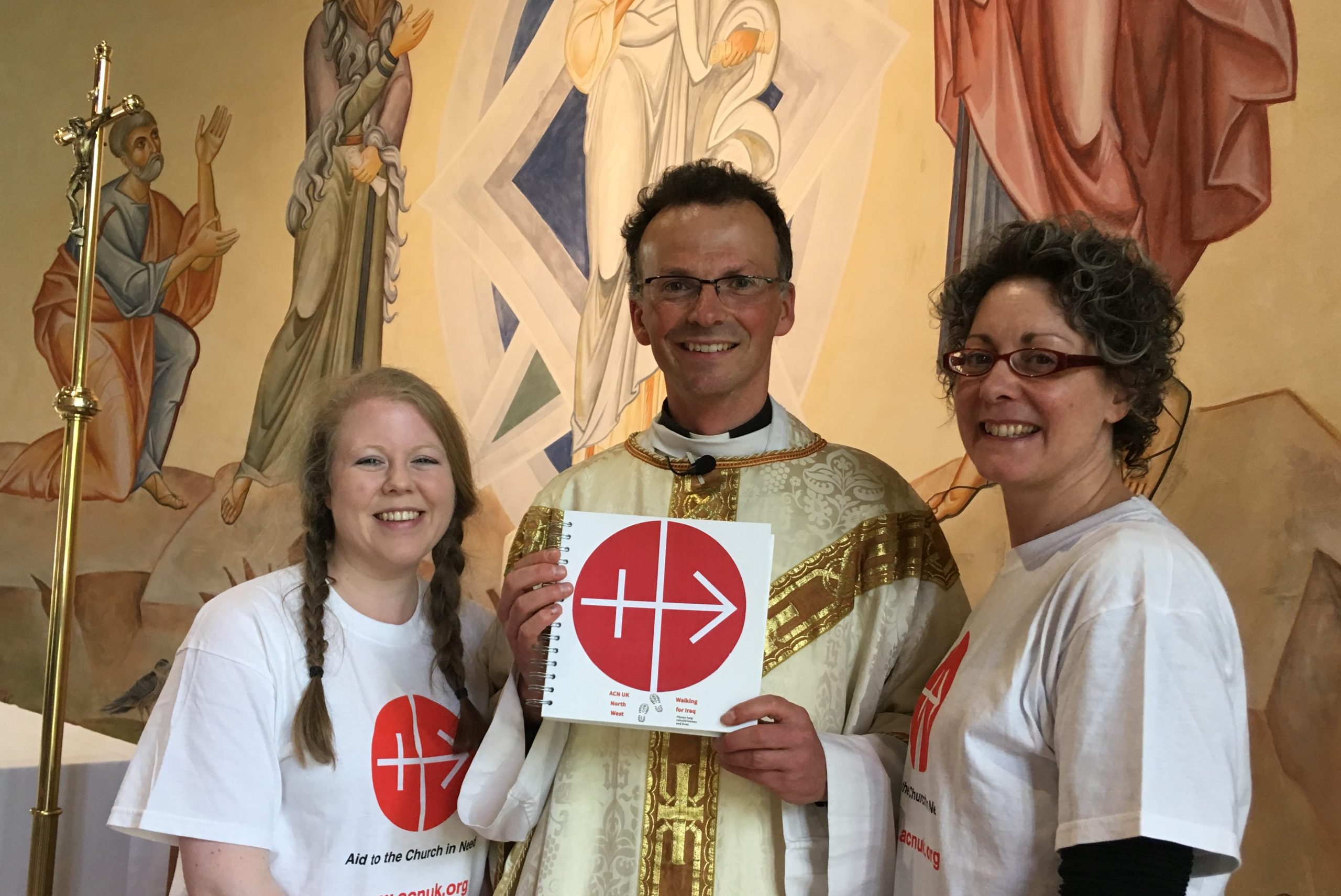 Father Philip Conner welcomes Bridget (left) and Caroline to the Catholic Chaplaincy at Lancaster University (© Aid to the Church in Need)