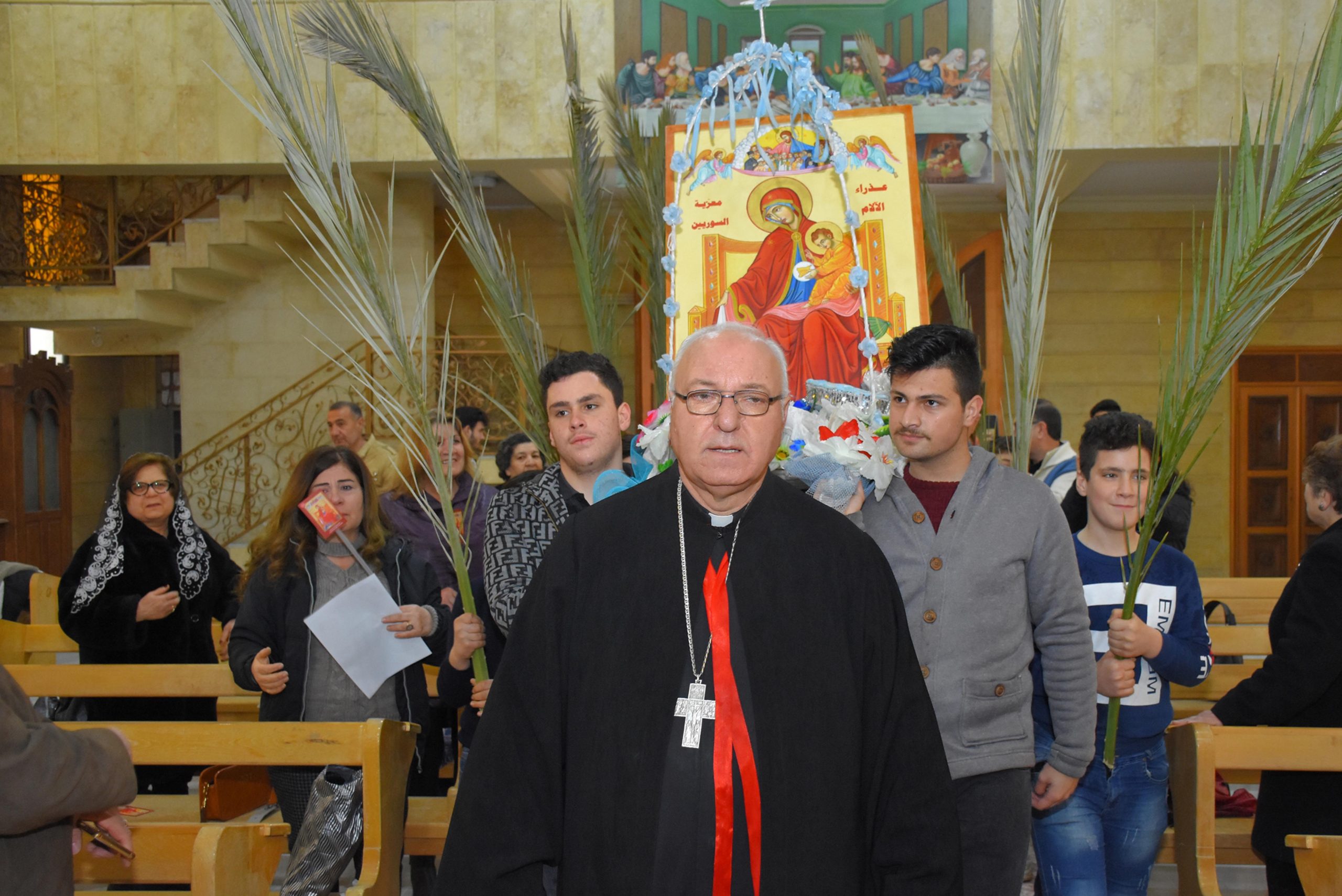 An icon procession is led by Chaldean Catholic Monsignor Nidal Thomas, Chaldean vicar of Hassake, north-east Syria