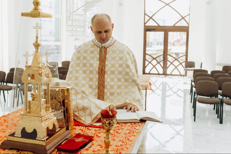 A Ukrainian Greek-Catholic priest in the Archeparchy of Ivano-Frankivsk celebrating the Divine Liturgy in an empty church because of the COVID-19 lockdown