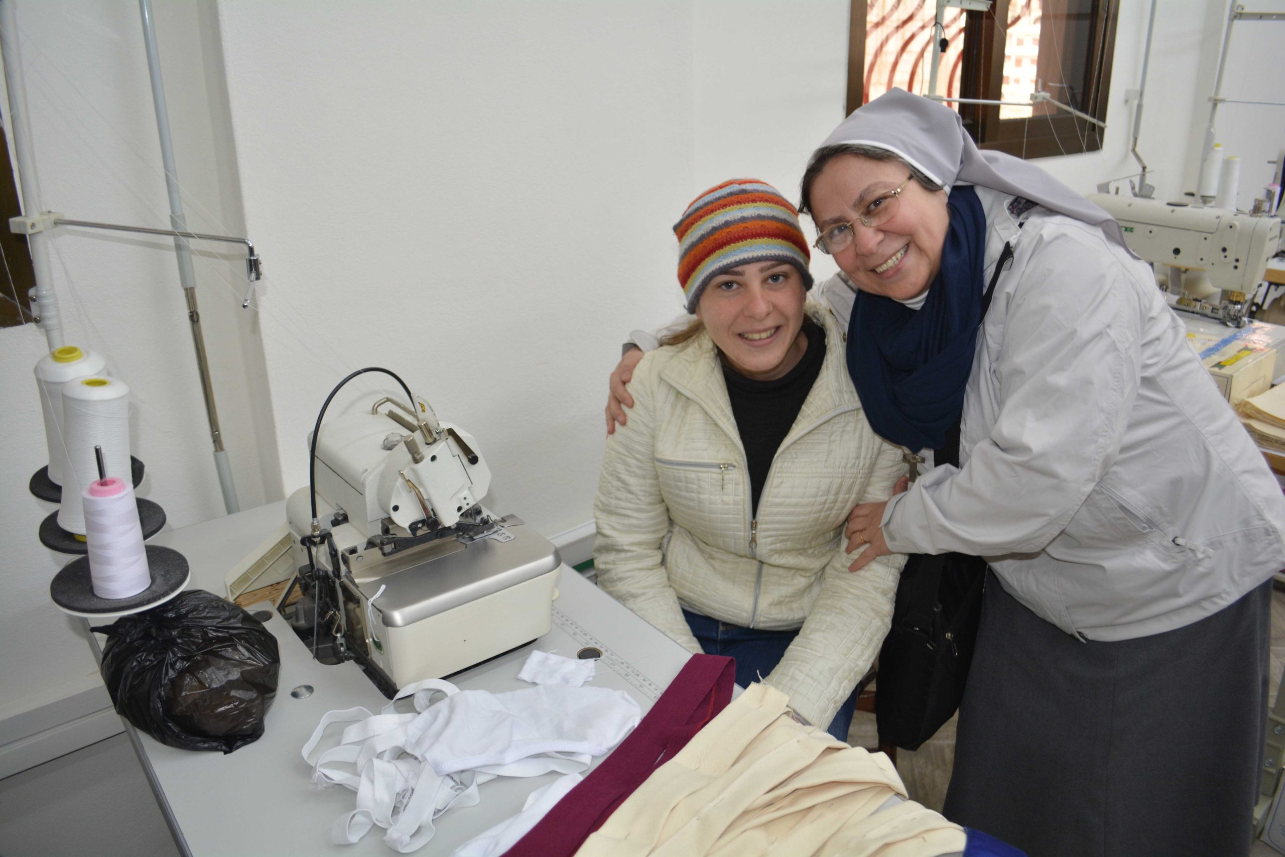 Sister Annie Demerjian with tailor Takla al Safadi in a workshop in Maaloula.