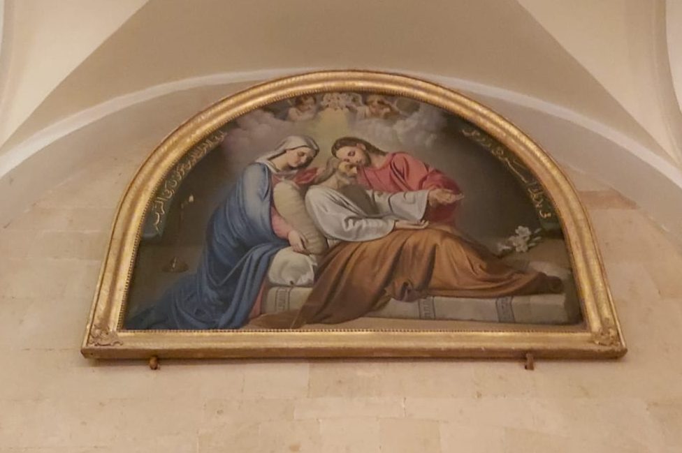 An image showing the Holy Family in the restored church.