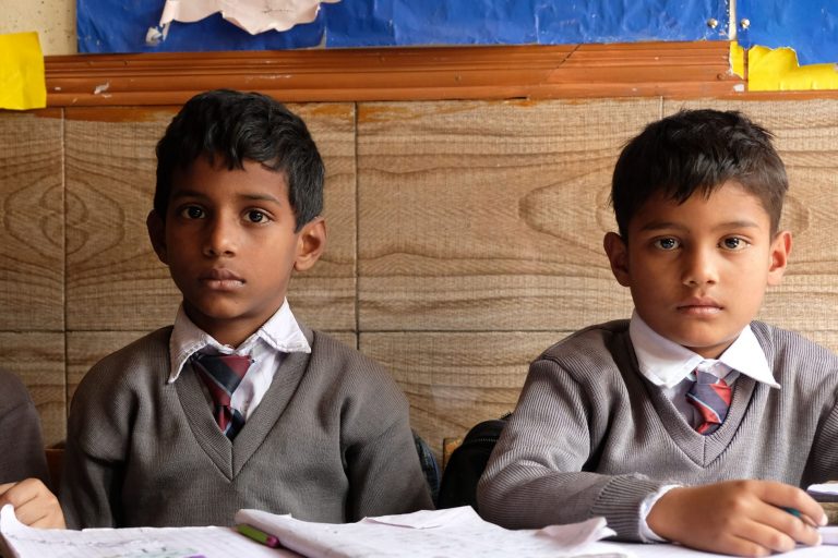 With stock image of Christian school children (© Aid to the Church in Need)