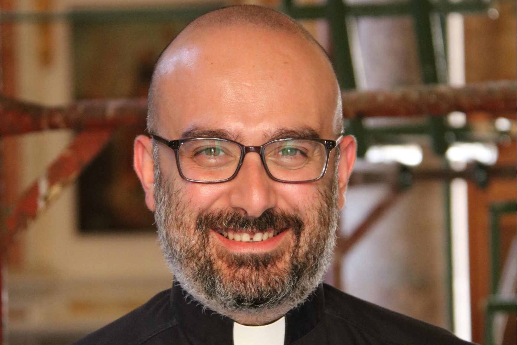 With picture of Father Jad Chlouk (Image © Aid to the Church in Need)