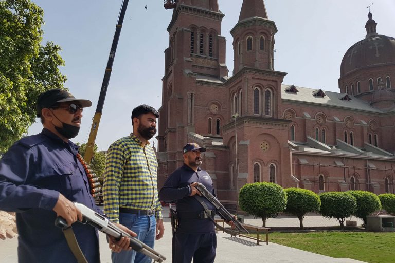 Security guards at Sacred Heart Cathedral, Lahore.