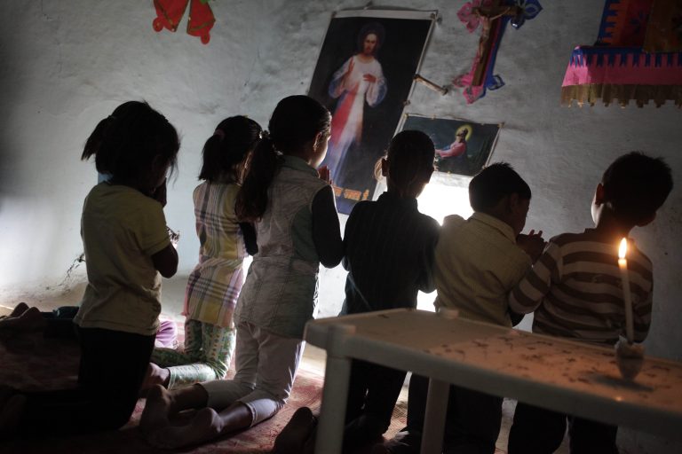A small Christian community praying in a rural village in Sagar Diocese (© ACN)