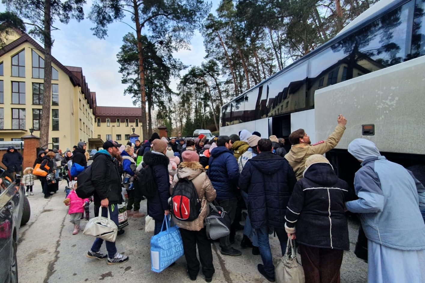 Ukrainian refugees arriving at the retreat house in Lviv on their way to Poland.