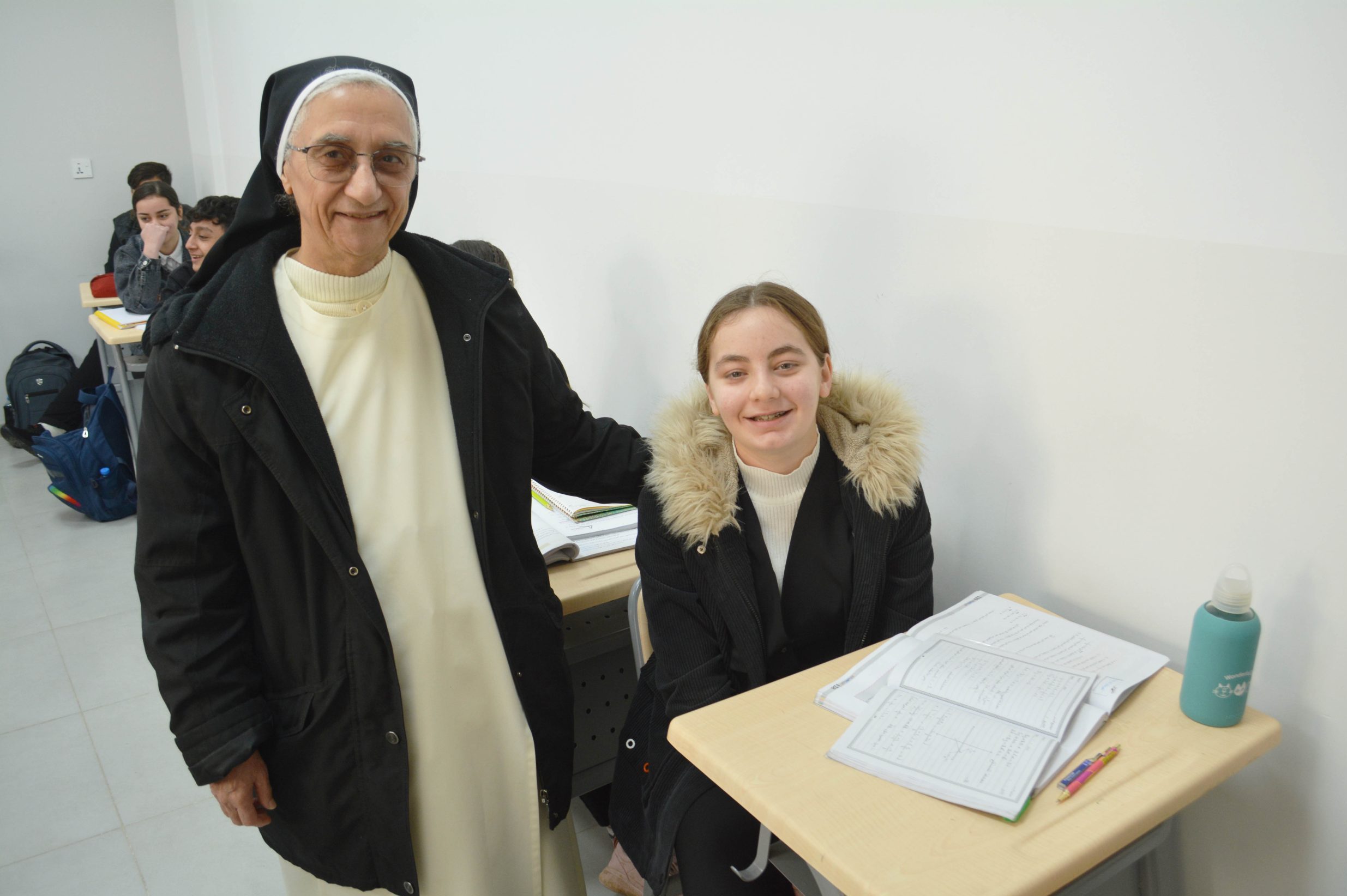 With picture of Sister Huda and student Rameel Rabu Wadi (© ACN)