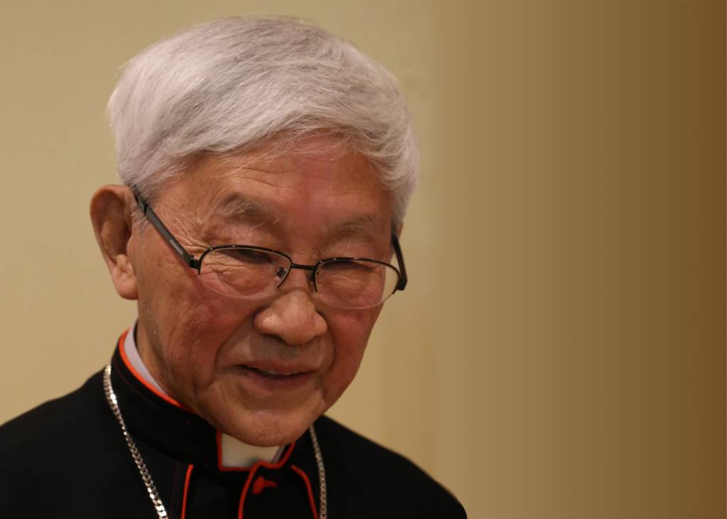 With picture of arrested priest Cardinal Zen (© ACN)