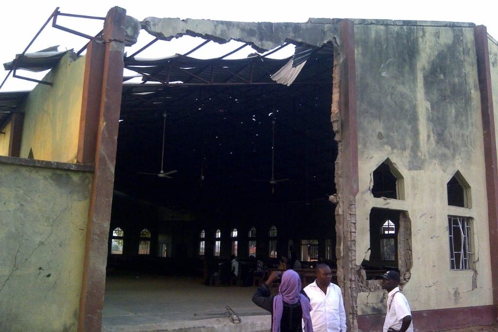 The aftermath of an attack by a Boko Haram suicide bomber on a church in Kaduna.