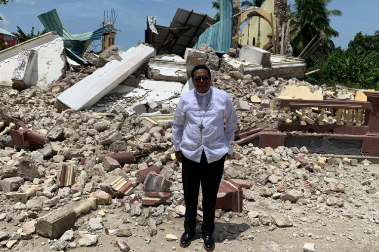 Bishop Pierre-Andre Dumas at a church in Anse-à-Veau-Miragoâne Diocese after an earthquake.