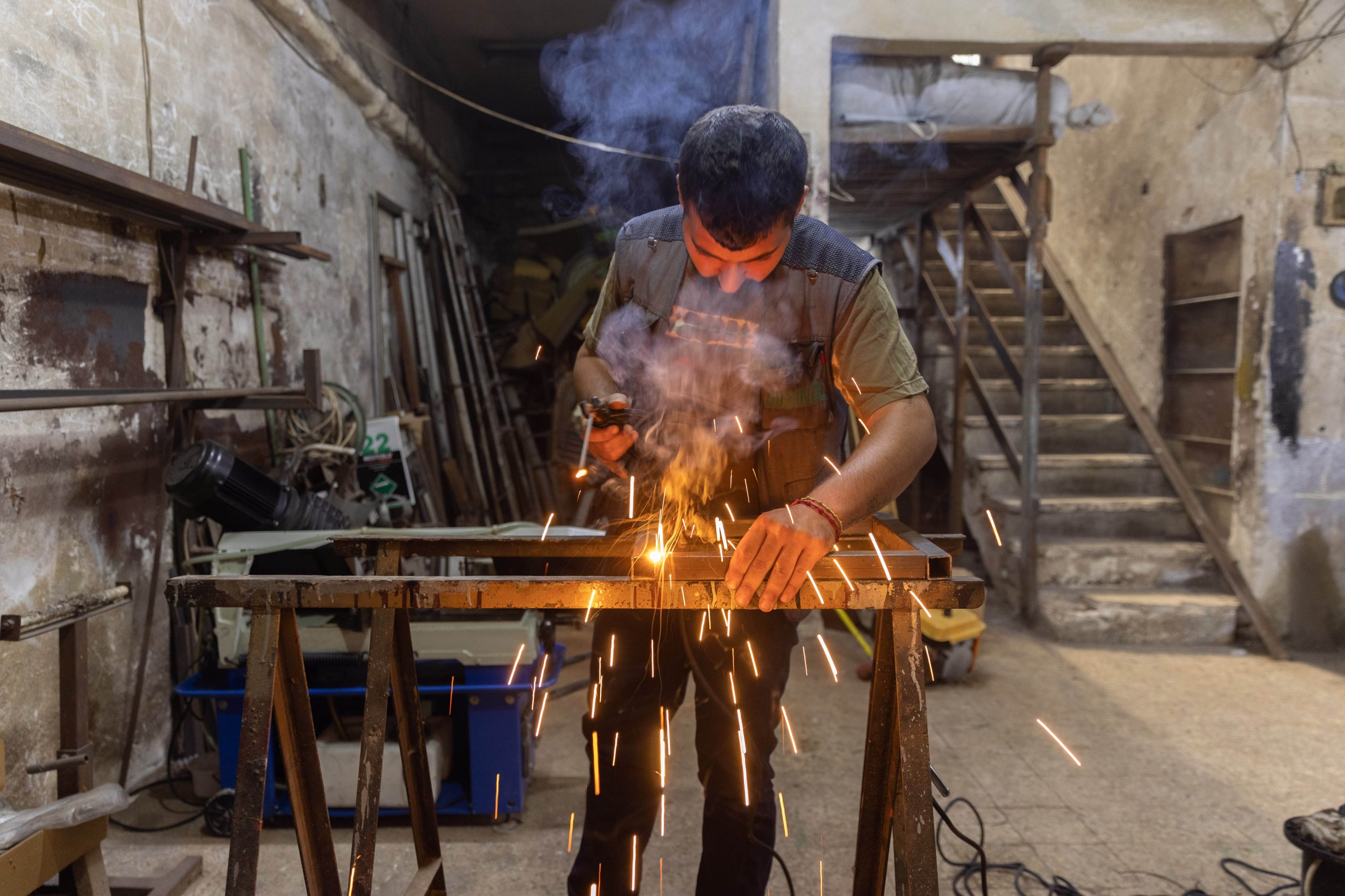 Hope Centre beneficiary Youssef Afesa working in his smithy in Damascus. (© Hope Centre/ACN)