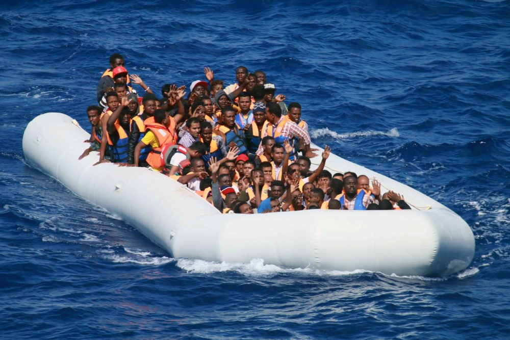 Illegal migrants aboard an inflatable dinghy (Image: US Navy – Chief Information Systems Technician Wesley R. Dickey).