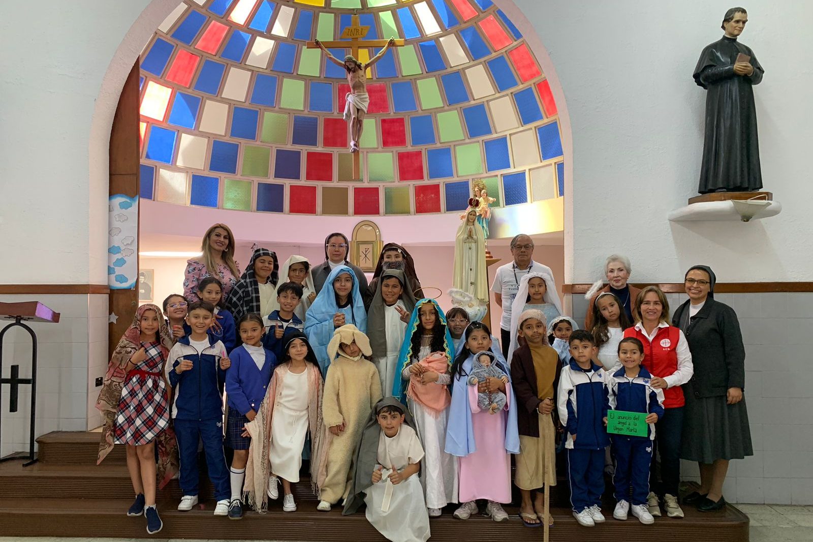 Children praying the Rosary in Bogotá, Colombia.