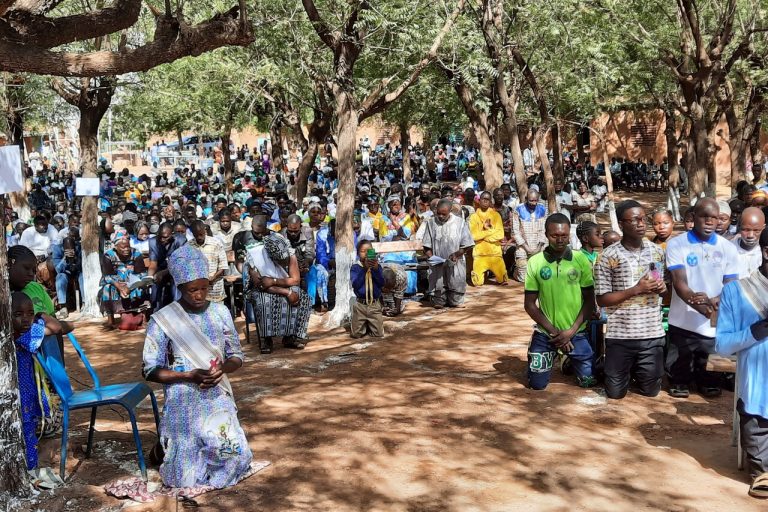 Christians praying in Burkina Faso.