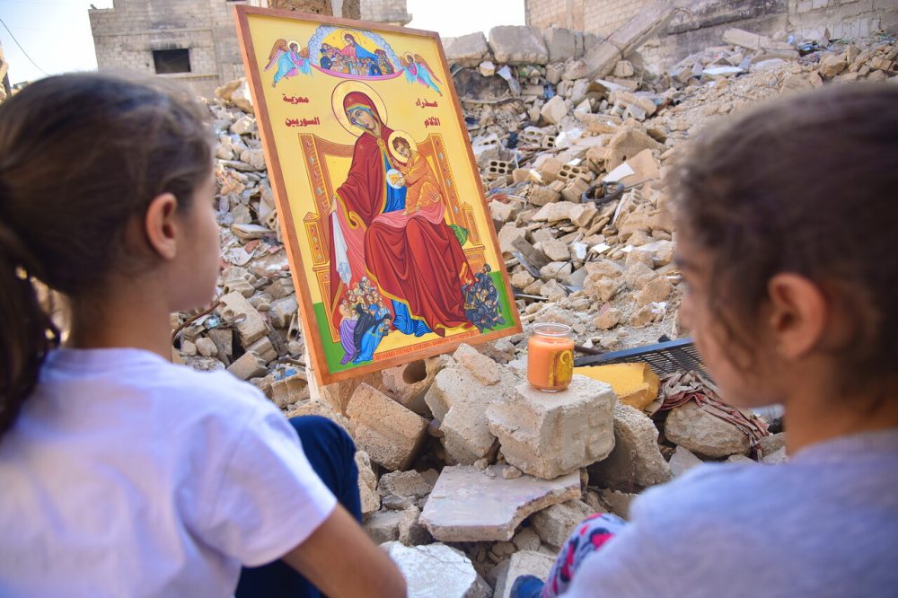 Children praying in Eastern Ghouta, Syria.