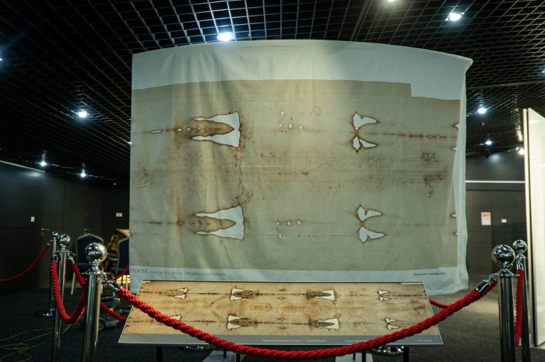 With picture of the Shroud of Rabat (© Catholic Information Service of Central Asia /ACN)
